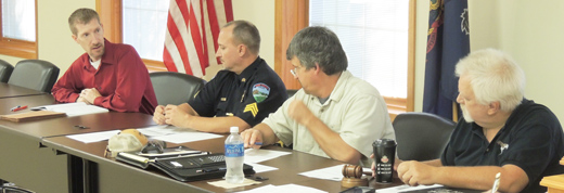 Senate Engineering's Ben Bothell updates Manor Township supervisors on last-minute construction projects ongoing throughout the area last night.