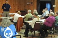 Commissioner Jason Renshaw answers a question posed by Kiski Township Resident Regina Liermann during last night's town hall meeting in Leechburg.
