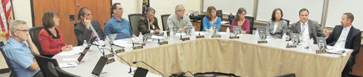Armstrong School District board directors talk through the three potential bond underwriting firms last night that could represent them in upcoming bond refinancing and new spending for district renovations and construction