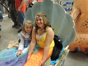 Seven-year-old Margot (left) and 11-year-old Regina (right) Mantini won first prize in the small group division of last night's parade for dressing up as