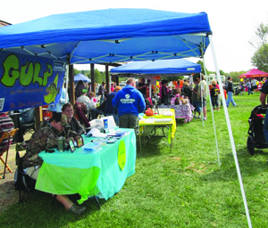 Crowds visit vendor tents at the Rural Valley Pumpkin Festival in 2015.