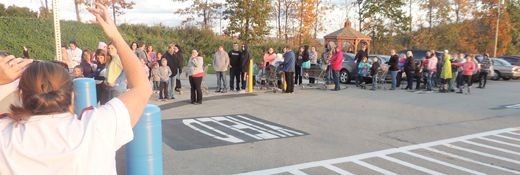 The line of families benefiting from this year's Salvation Army Project Bundle Up crossed into the WalMart parking lot last night during check-in. More than 110 individuals shopped for winter coats, boots and hats with volunteers.