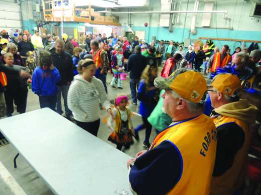 All costumed participants received a gold monetary coin for participation in the parade.
