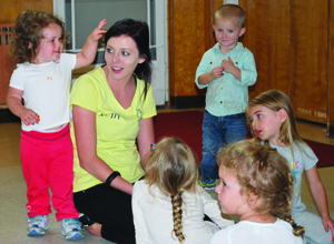 Freeport Bumblebee Learning Center Staff Member Hallie Shook conducts a learning exercise with children. The daycare center, which opened in August in the former Kindergarten Center, currently has openings for enrollment. Contact the office at 724-540-5334.