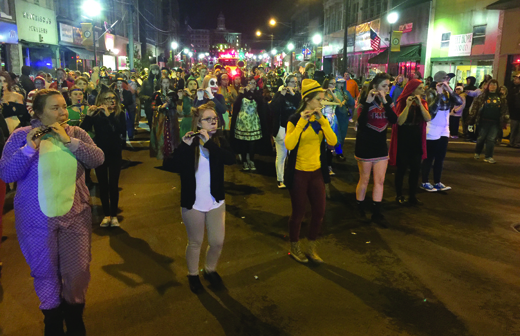The Armstrong River Hawks Marching Band played along Market Street dressed in Halloween attire during last night's parade in Kittanning.