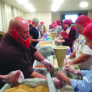 Local Churches Pack Meals for African Nation