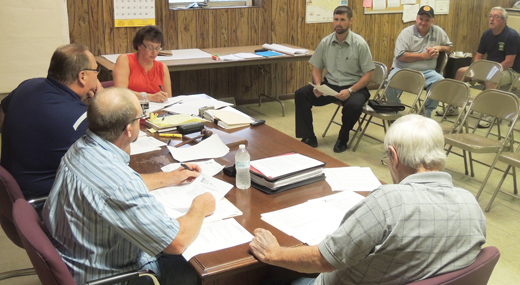 North Buffalo Township supervisors get an update on the Sportsman Road culvert project from Township Engineer Joshua James, of Young and Associates, last month.