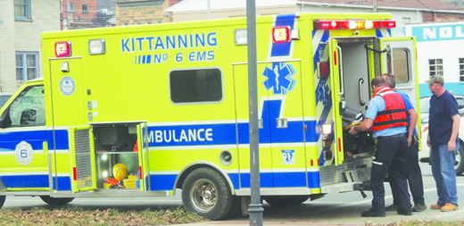 Kittanning #6 Ambulance prepares to transport a Kittanning-area woman to ACMH Hospital in East Franklin Township yesterday evening after an apparent jump from the Kittanning Citizens Bridge. According to police, the woman was listed in stable condition last night