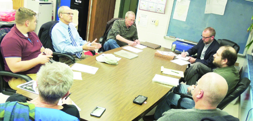 Ford City Borough Planning Commission members and elected officials listen and take notes as Department of Community and Economic Development Planning Program Manager Dennis Puko advises the group at their last public meeting.