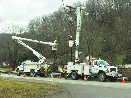 West Penn Power technicians install new transformers and prepared additional lines that will provide power to Ryan’s Creek House. Traffic traveling Route 66 in Bethel Township yesterday had minor delays due to lane restrictions.