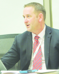 Armsrong School District Finances and Operations Director Sam Kirk updates school board members on upcoming building projects during last night's open caucus session.